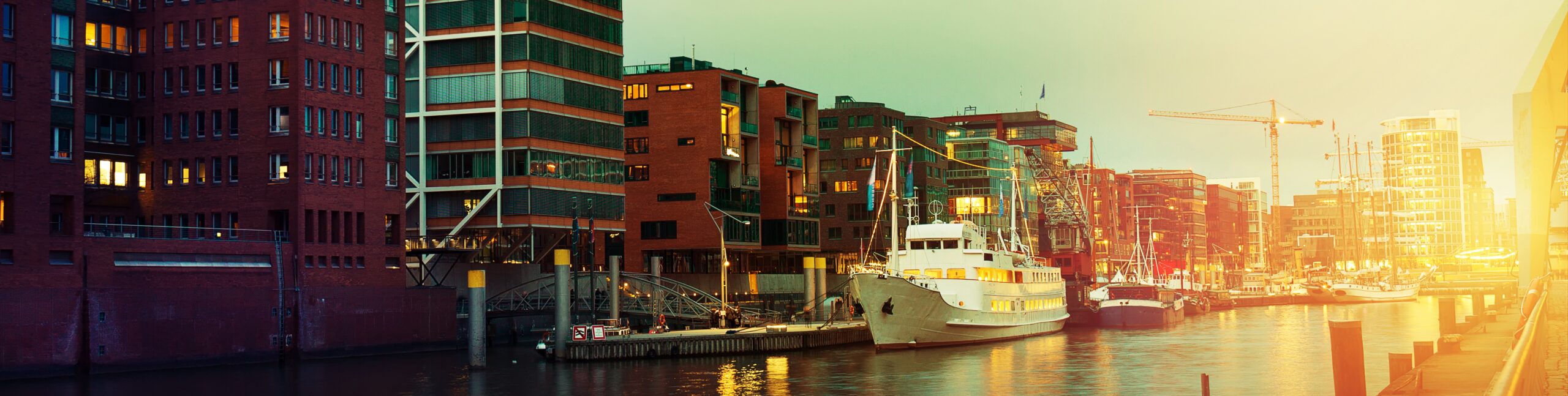Beautiful Picture of Sunset in Port City with Water, Ships and Bridge. Toning. Hamburg, Germany. High Class Escort Hamburg